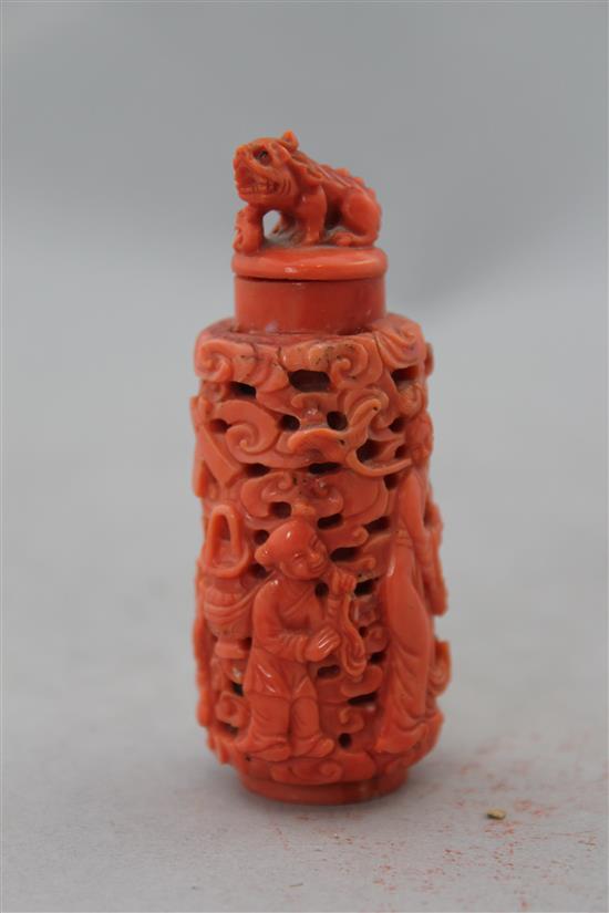 A Chinese coral snuff bottle, late 19th / early 20th century, 7.5cm, stopper glued